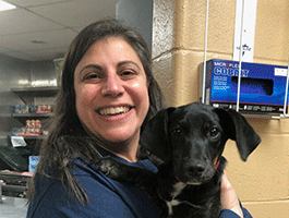 Denise holding puppy