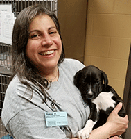 Denise holding puppy
